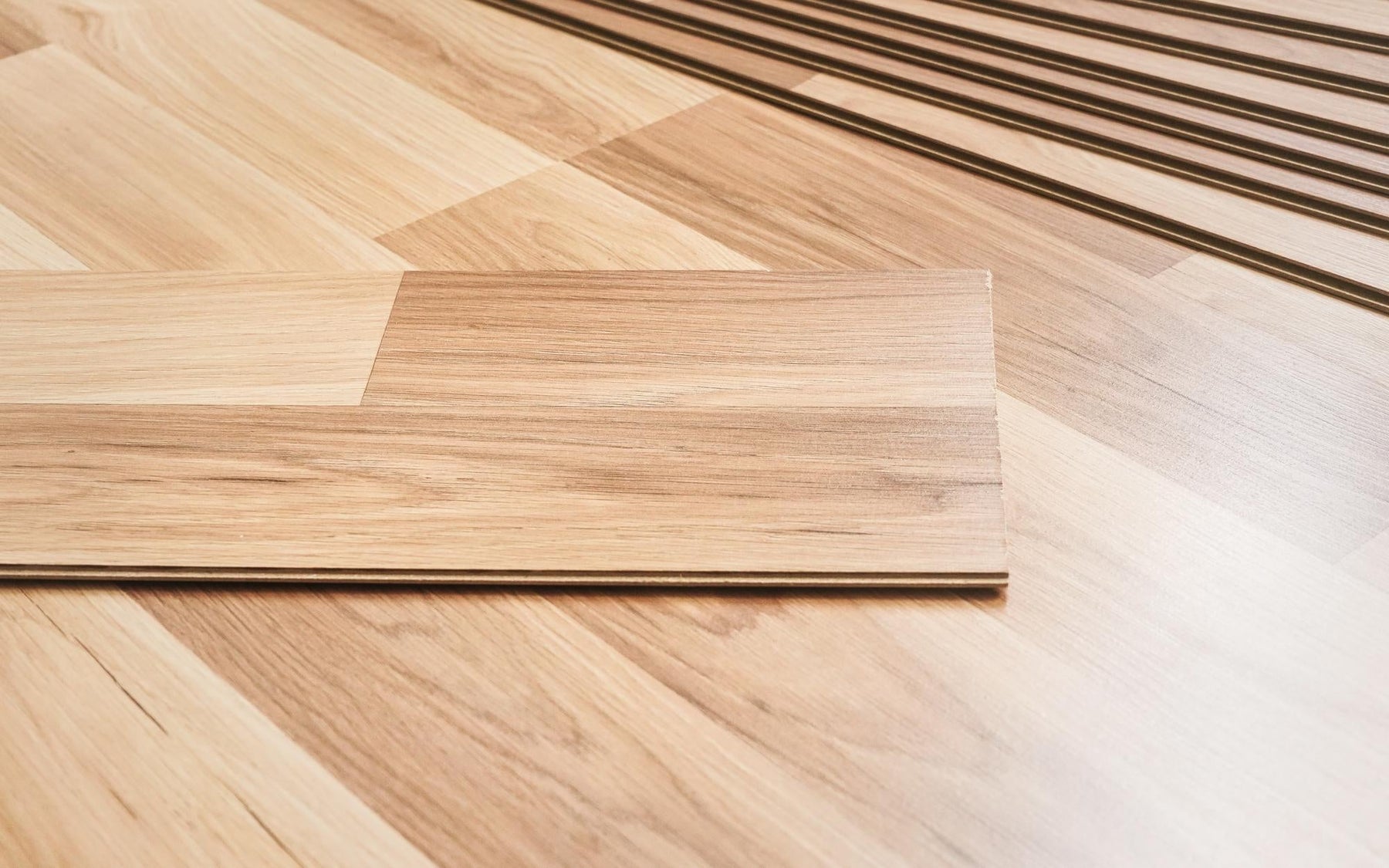 Engineered Wood Flooring vs Laminate: A Detailed Comparison - The Panel Hub