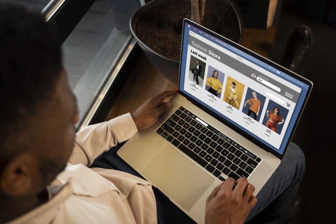 A person browsing an online store on a laptop.