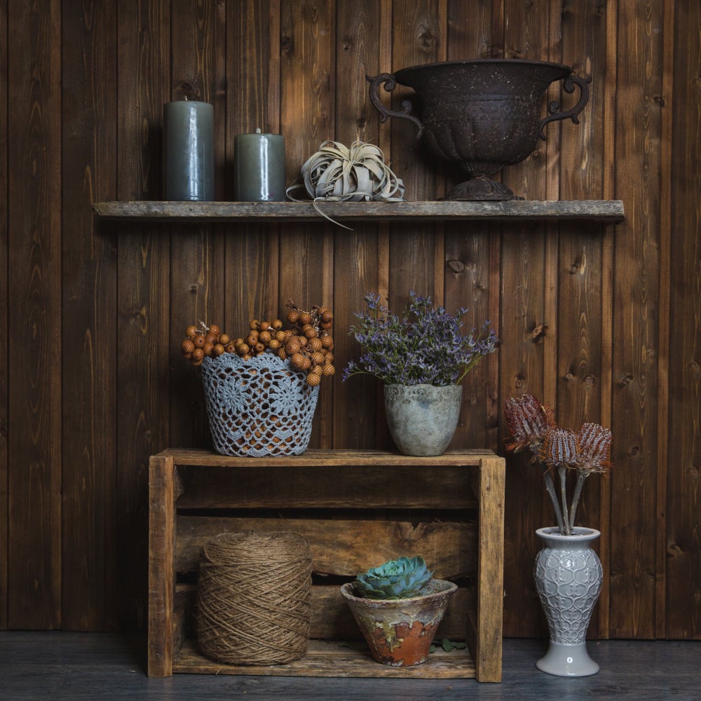Americana design featuring vintage trunks, repurposed ladder shelves, and rustic metal accents for a nostalgic look.