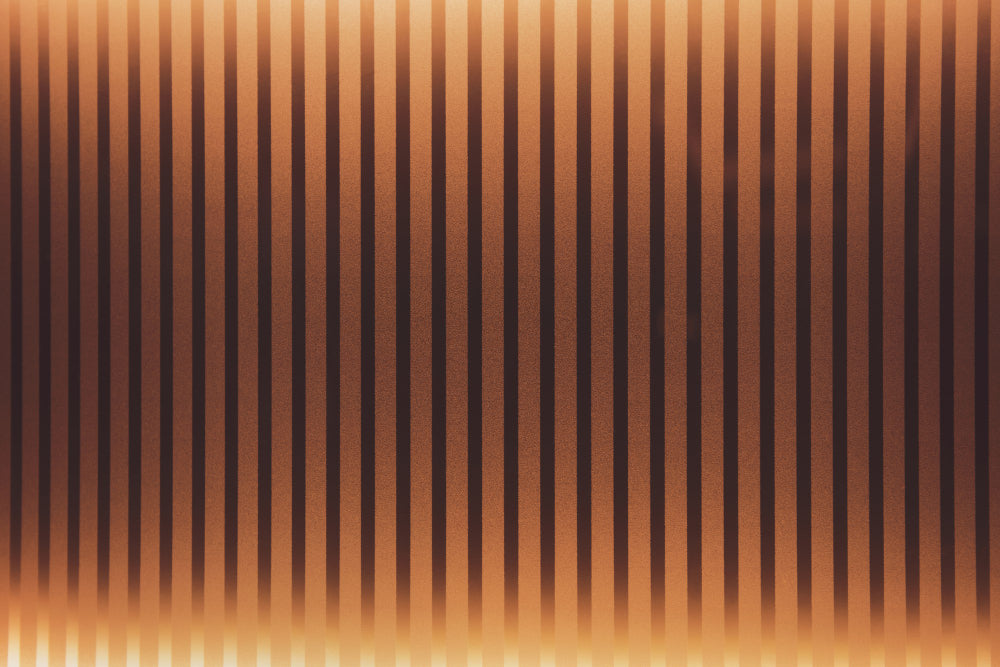 Americana interior design with warm amber lighting, stripe wall panels, and natural textures for an inviting home.