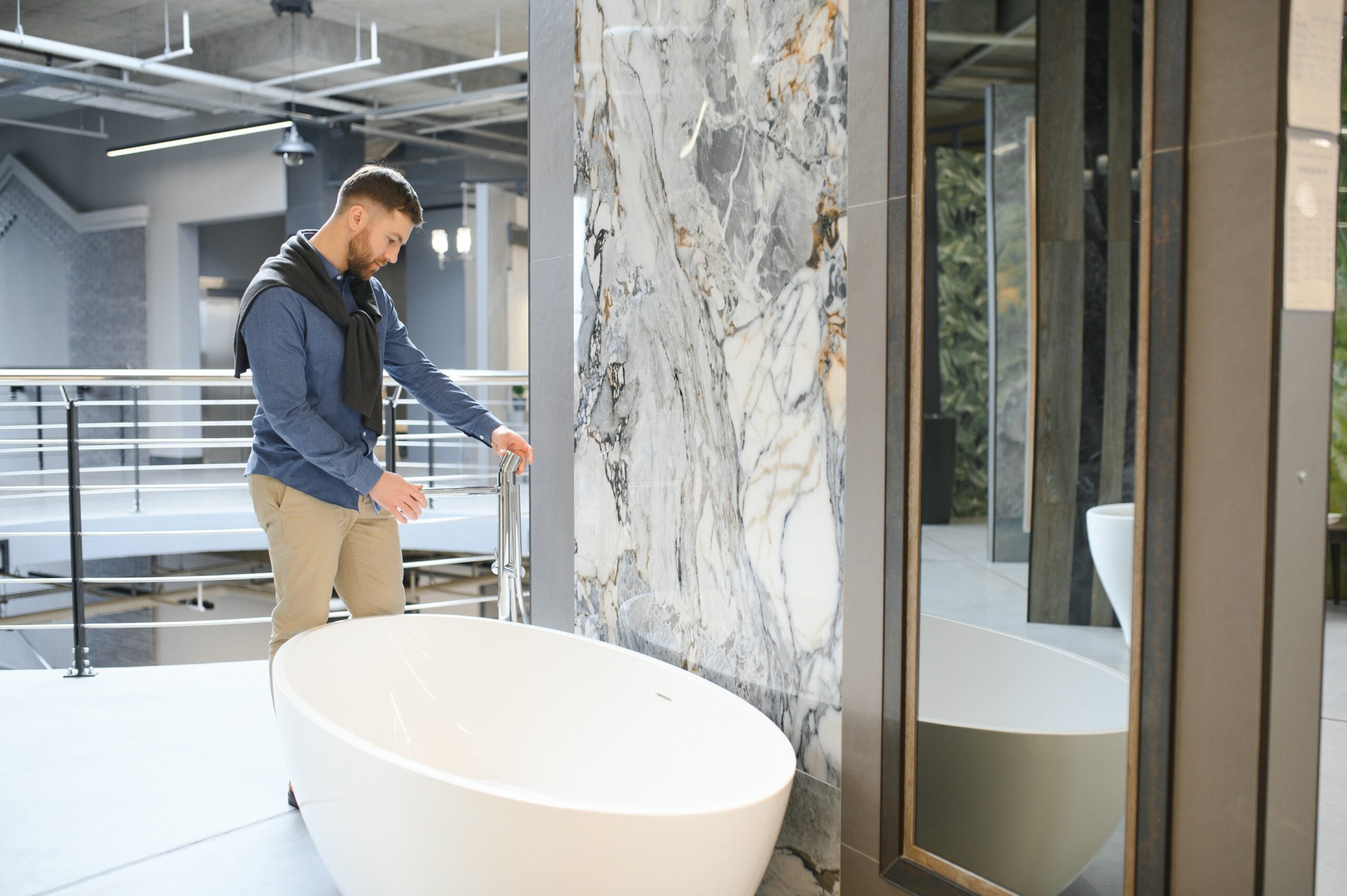 man-looking-bath-house-ceramics-plumbing-materials-The Panel Hub